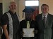 Pastors Tim & Bill with an Uganda graduate